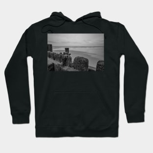 Close up of wooden sea defences protecting against coastal erosion Hoodie